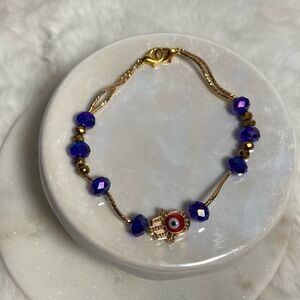 Turkish Evil Eye Bracelet
blue and gold color
